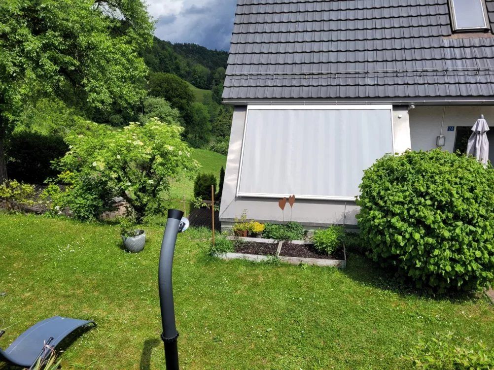 Seitenmarkise am Einfamilienhaus